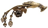 image for brooch Burlesque beige/white Very Light Antique Brass (hand-like element with hang-in pearls & flower)