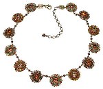 image for necklace Beaded Lights brown antique brass (13 bended flowers connected together)