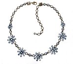 image for necklace Magic Fireball light blue antique brass (5 flowers along half the neckline)
